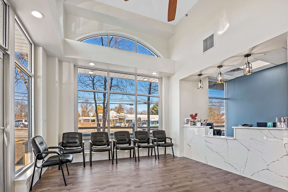 Sunrise Dental Ipswich MA reception area with seating and front desk