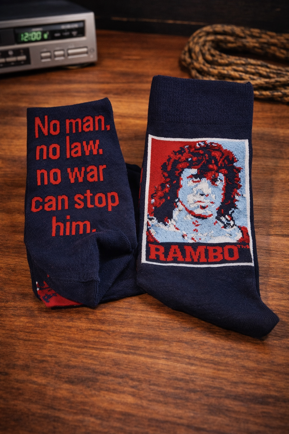 Thumbnail: Rambo inspired socks gift set in a retro VHS box with quote tag. A unique 80s action movie gift for him, perfect for birthday