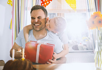 Son surprising his father with birthday