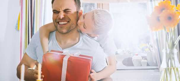 Son surprising his father with birthday 