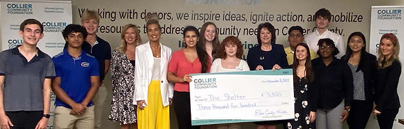 Student Philanthropy Council check presentation to The Shelter for Abused Women & Children