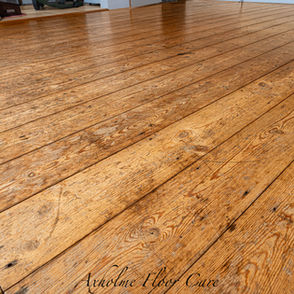 Worn Pine Flooring. In need of restoration.