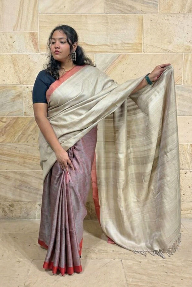 Warm ivory with coral border tussar silk saree. Best tasar silk in India