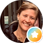 Smiling woman in a circle frame with a star badge icon.