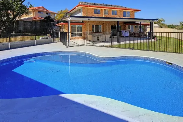 Light Blue liner creating clear, bright water tone in backyard setting.