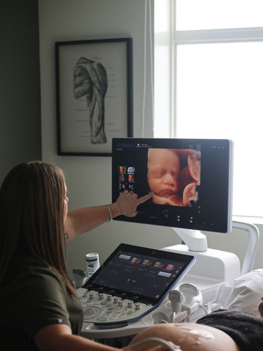 Close-up of an ultrasound monitor during a diagnostic scan at Sono Suite