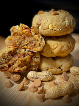 Stack of keto peanut butter chip cookies on a cutting board