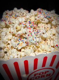Bowl of colorful party popcorn with sprinkles