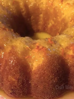 Close-up of moist orange pound cake with citrus glaze