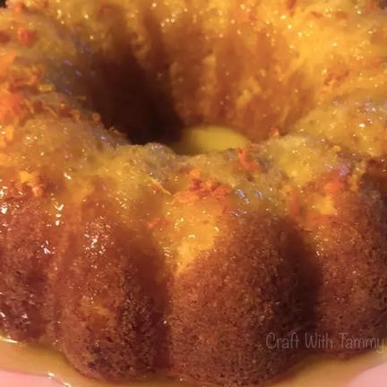 Close-up of moist orange pound cake with citrus glaze