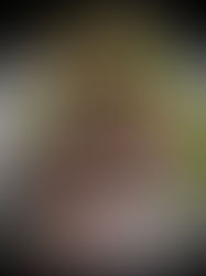 Lettuce-wrapped Unwich sandwich filled with turkey, roast beef, salami, tomato, and cheese.