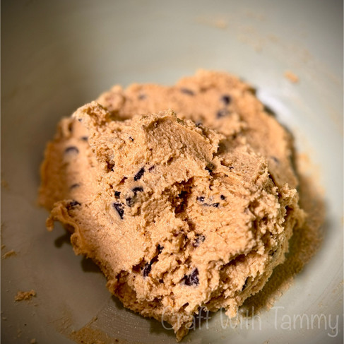 Keto cookie dough with chocolate chips in a mixing bowl