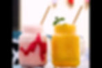 A strawberry Milkshake and tropical fruit juice