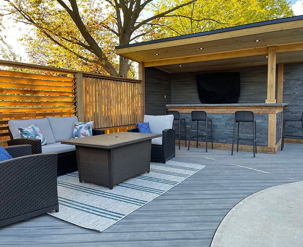Custom backyard patio and outdoor entertaining space by HIGHBUSH