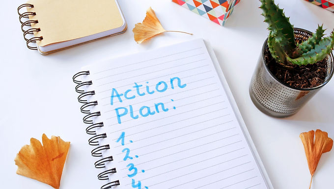 Notebook with title 'diet plan', cultlery, pen and tape measure