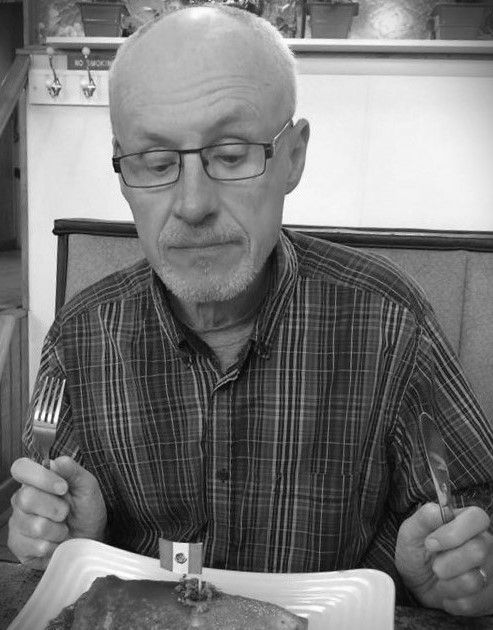 Black and white photo of the author, Phil Huffy.