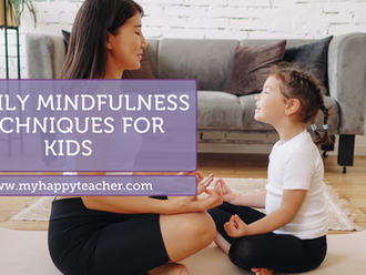 A woman and young girl sit cross-legged on the floor, facing each other with eyes closed in a meditation pose. They are in a living room with a gray couch and plant visible. Text overlay reads: '4 Daily Mindfulness Techniques for Kids' with website www.myhappyteacher.com.
