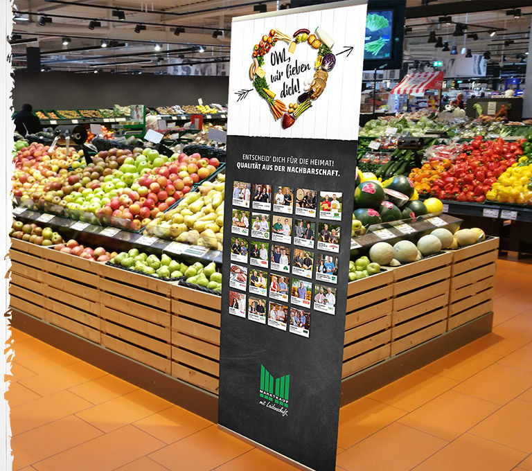 Ein Aufsteller zur Regionalkampagne im Marktkauf Lage.