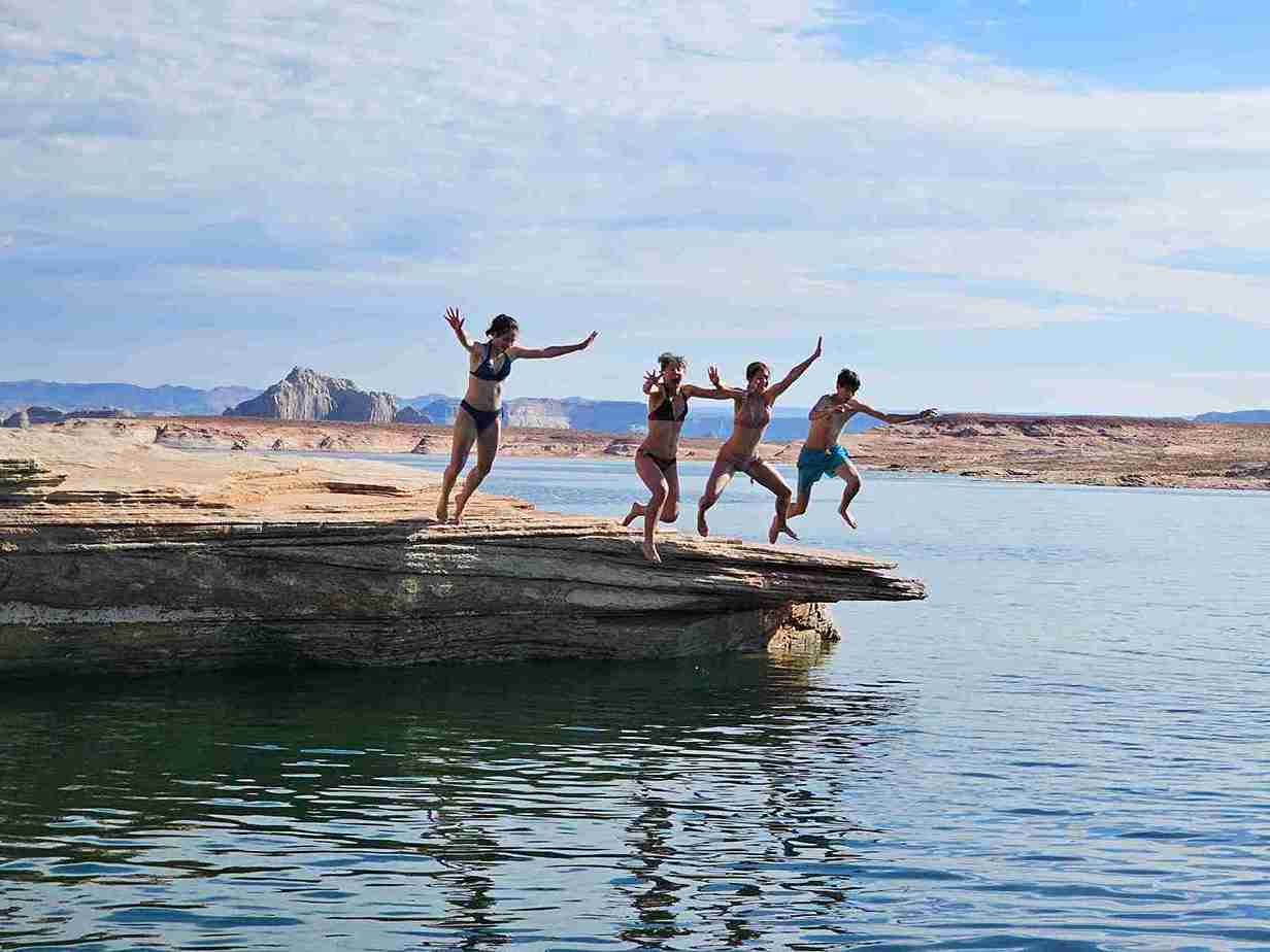 Crystal-Clear Waters Of Lake Powell, Perfect For Swimming With Lake Powell Experience.