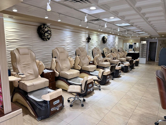 Modern nail salon with comfortable pedicure chairs
