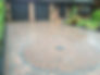 Driveway with a circular pattern, made up of block paving