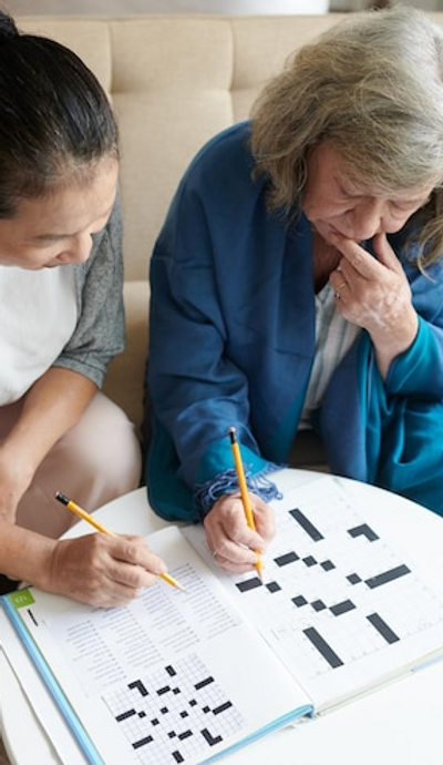 pensive-women-solving-crossword.png