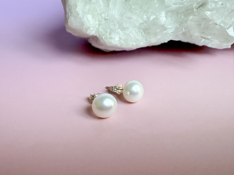 Thumbnail: White Freshwater Pearls stud earrings in sterling silver
