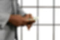 black-businessman-s-hands-holding-money-american-dollars-white-background-it-s-never-enoug