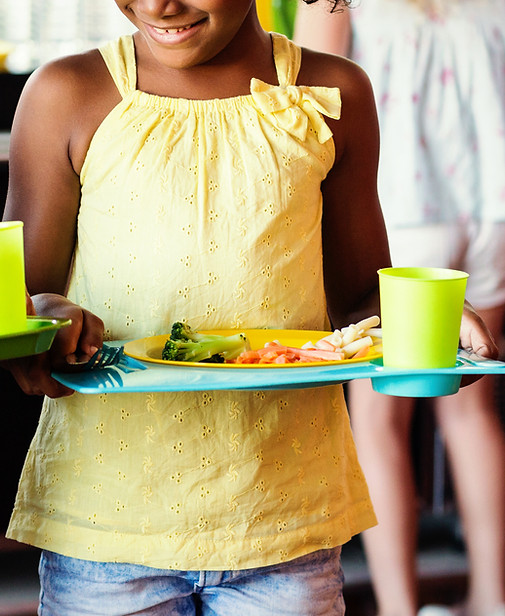 children-holding-food-tray-canteen.jpg