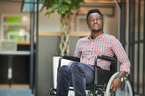 african-disabled-office-worker-sitting-wheelchair-he-is-office-building.jpg