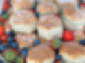 butter scones garnished with fruit and dusted with icing sugar for an event in warwickshire