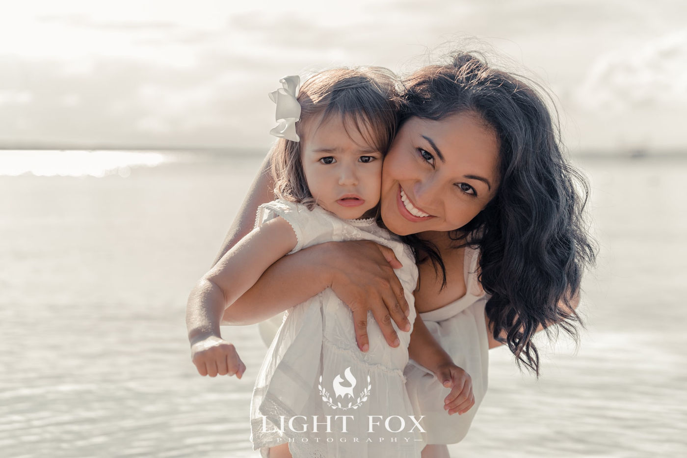 Family photoshoot in Sylvan Lake. Beach family photos. Light Fox Photography.