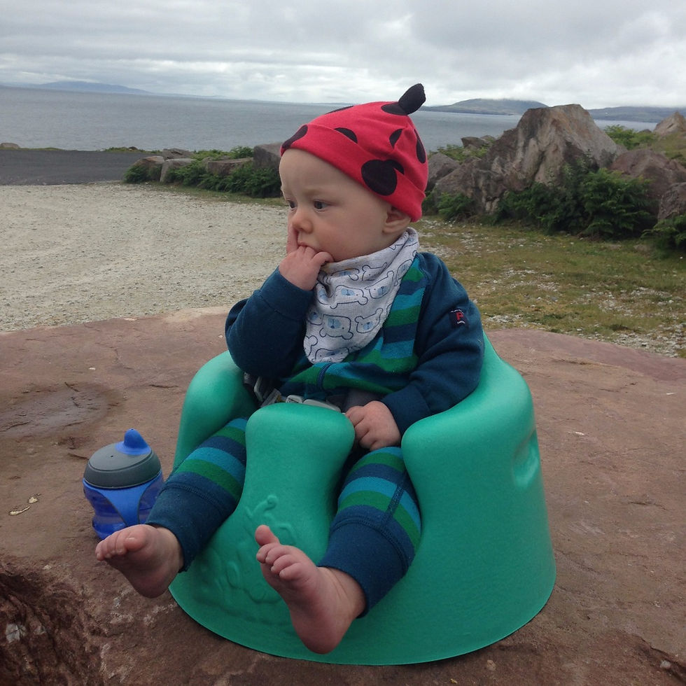 Outdoor baby in Bumbo on Achill Island