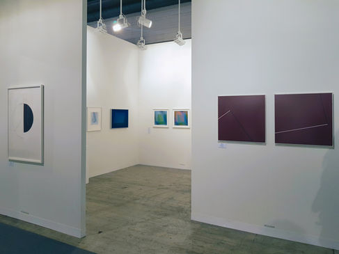 Angled view of the stand of the Atelier Éditions Fanal at Art Basel 2019, Basel, constructed art works and concret, 2019