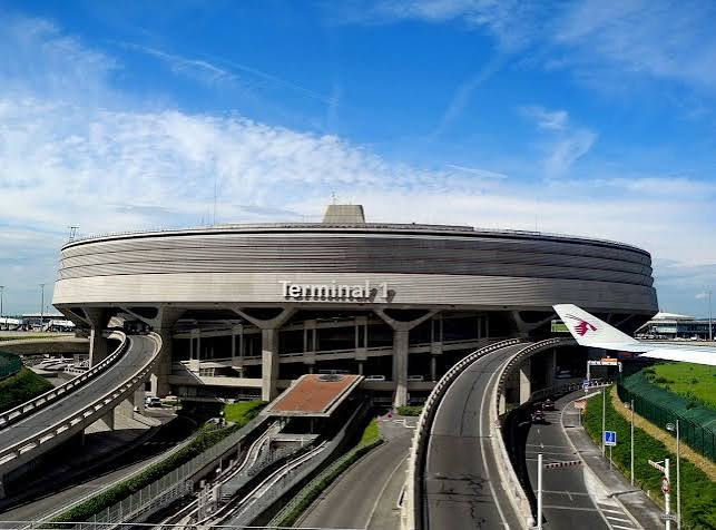Designed by Paul Andreau. the Terminal 1 Building features a giant disc of raw concrete 656 feet wide.