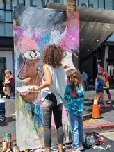 Artist Galeet Gia Zeituny live painting on Hollywood Boulevard