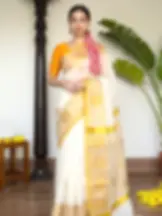 Golden Flower Jacquard Premium Kasavu Cotton Saree with Tissue Zari Pallu Front view