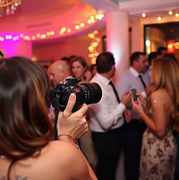 photographer at a party taking pictures.jpg