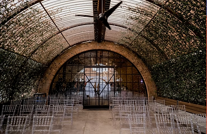 Ceremony setup at rustic Houston venue styled by all-inclusive wedding planner.