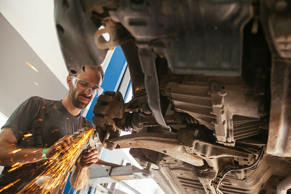 vecteezy_auto-mechanic-at-work_991421.jpg