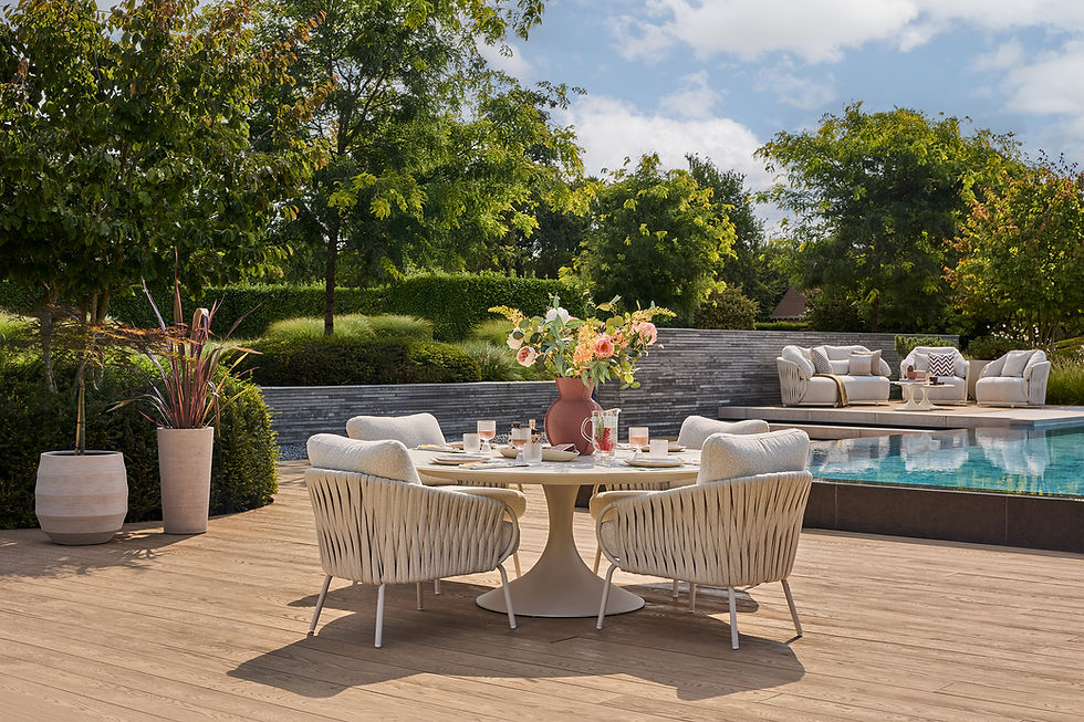 Eye-level view of modern teak garden furniture set on wooden terrace