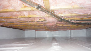 A completed crawlspace with fiberglass floor insulation and a diamondback vapor barrier installed along the sidewalls and ground floor of the crawlspace, termed crawlspace encapsulation, by CrawlspaceSolutionsNJ.com