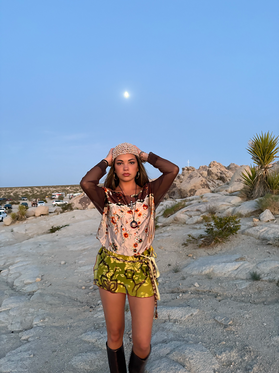 Photo courtesy of Katelyn Pohlman. This is her in the desert, showing off her signature sense of style!