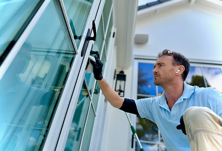 Elysian Window Cleaning touching up a few French Panes in Los Angeles