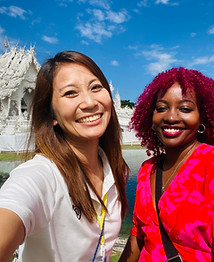 Chiang Rai Discovery
Travelers taking a selfie in front of the White Temple in Chiang Rai.