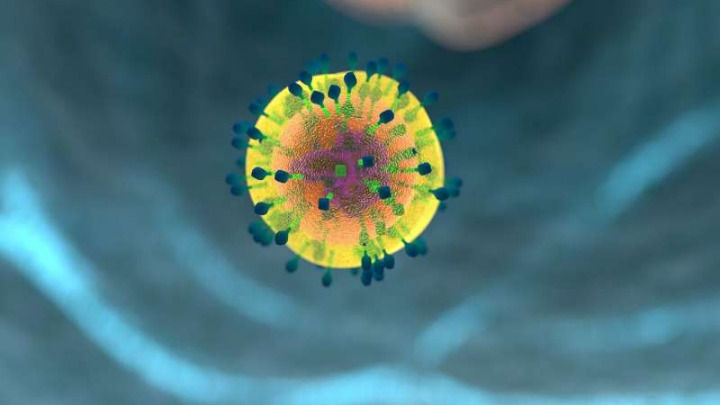 3D rendering of a spherical yellow virus with blue spikes, floating in a bluish organic environment. It features microscopic, textured details.