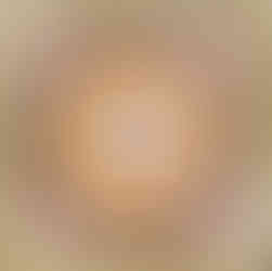 Mosaic tile with a circle pattern in in red and yellow on a white background