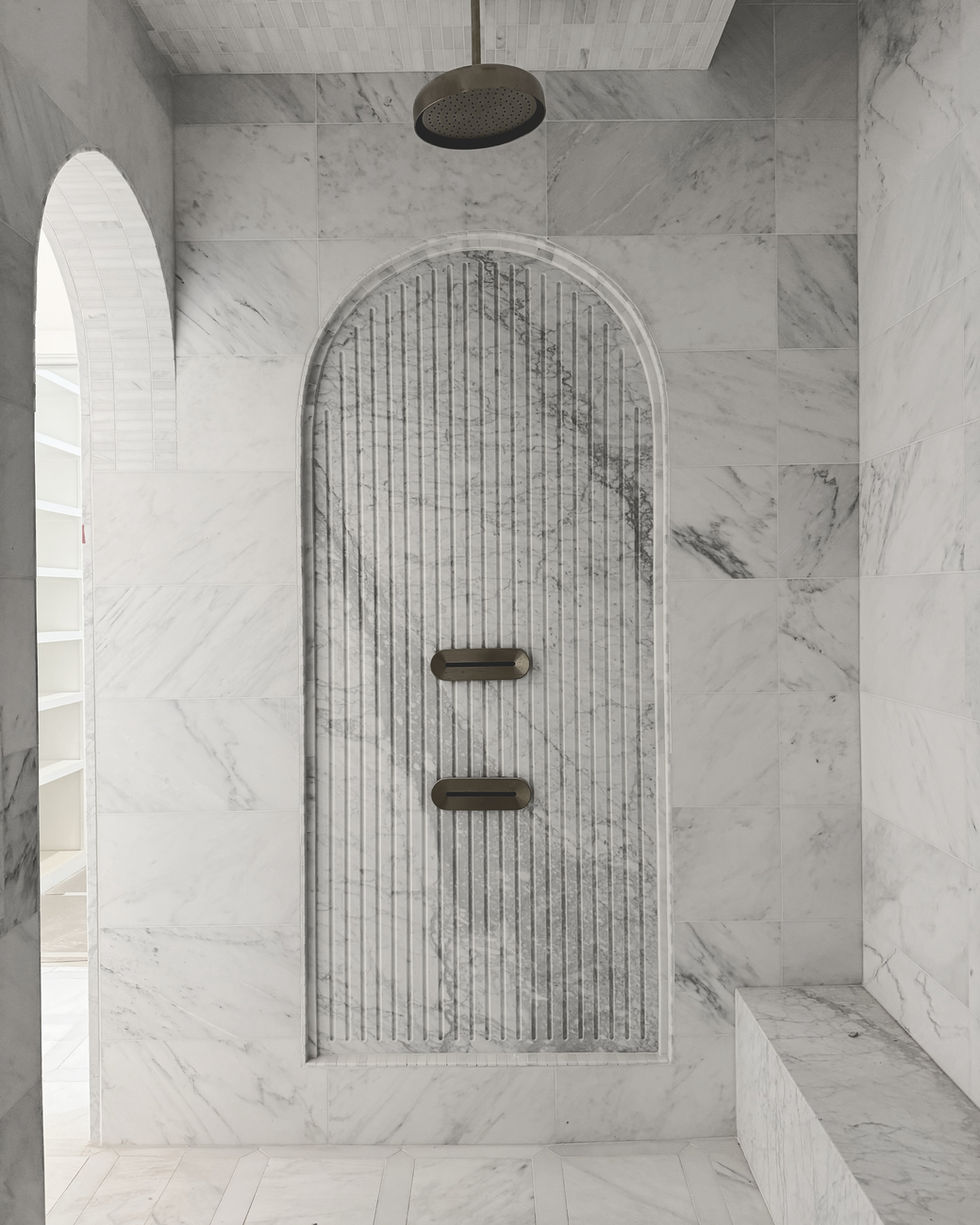 Glamorous shower with arches.