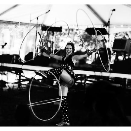 girl hula hooping with polka dot stockings on
