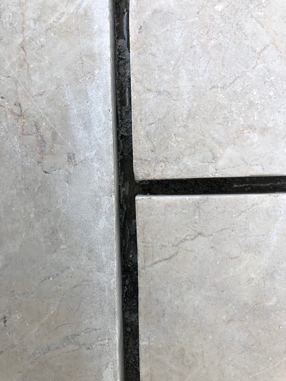 EXTERIOR MARBLE PATIO GROUT REPAIRS